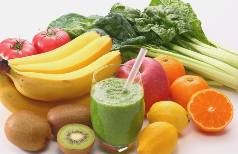 Nutrition and Hydration A variety of fresh fruits and vegetables with a green smoothie.