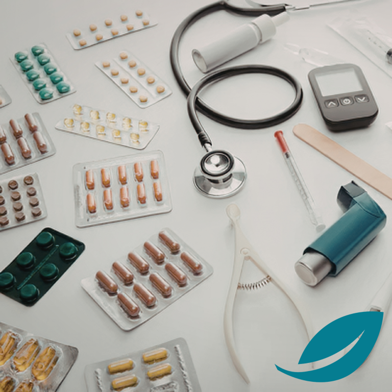 Week 2 - medicines and diabetes Assorted medications and medical equipment, including a stethoscope and blood glucose monitor.
