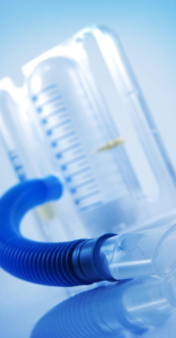 A transparent device with a blue tube, likely for fluid measurement or delivery.