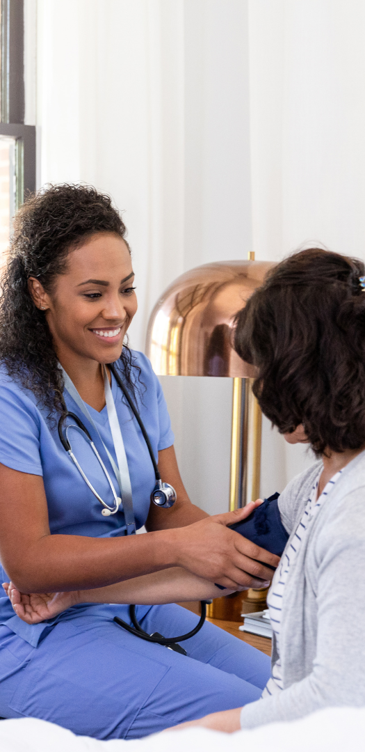 Measuring Observations A healthcare professional checks a patient's blood pressure in a bright room.